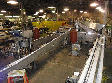 Insertion System with Vacuum Conveyor Machine